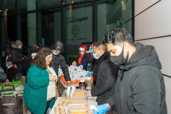 Distributing curry to the vulnerable and homeless