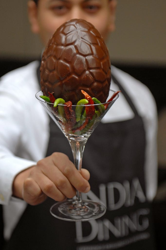 India Dining owner Asad Khan with the "Not for Bunnies" Easter egg
