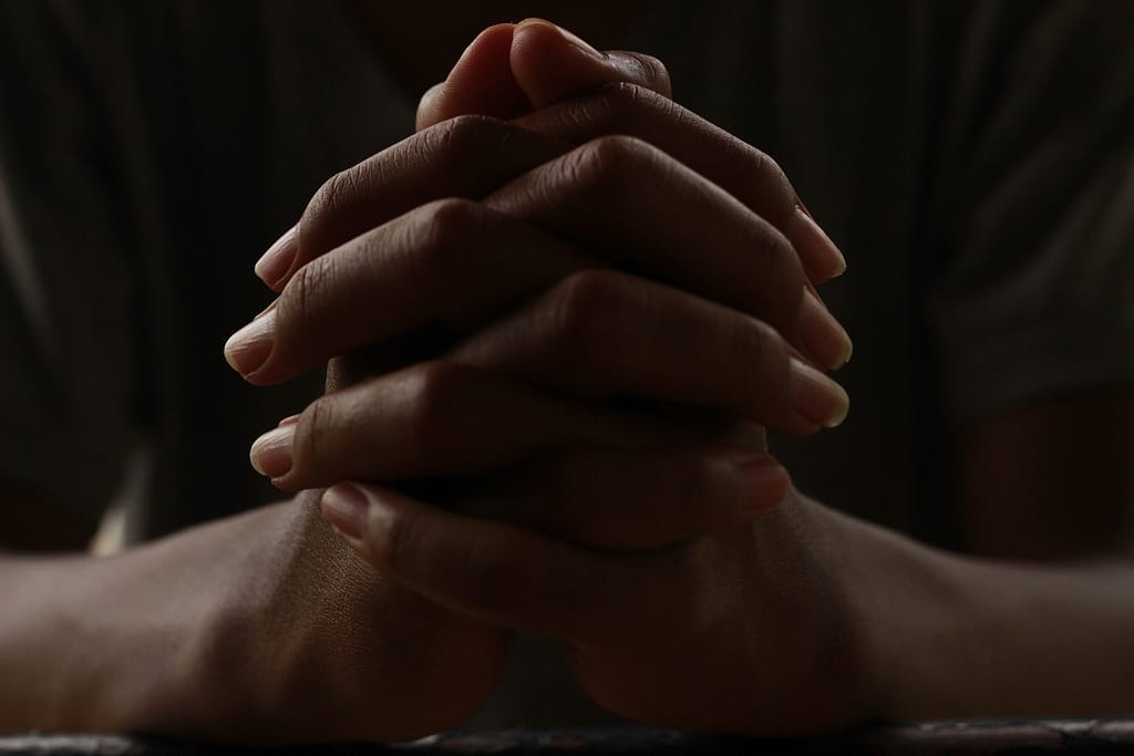 Hands praying